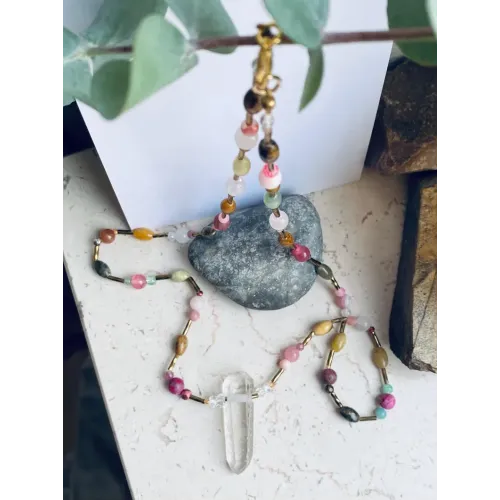Gemstone necklace with a rock crystal pendant Gemstone necklace with a rock crystal pendant