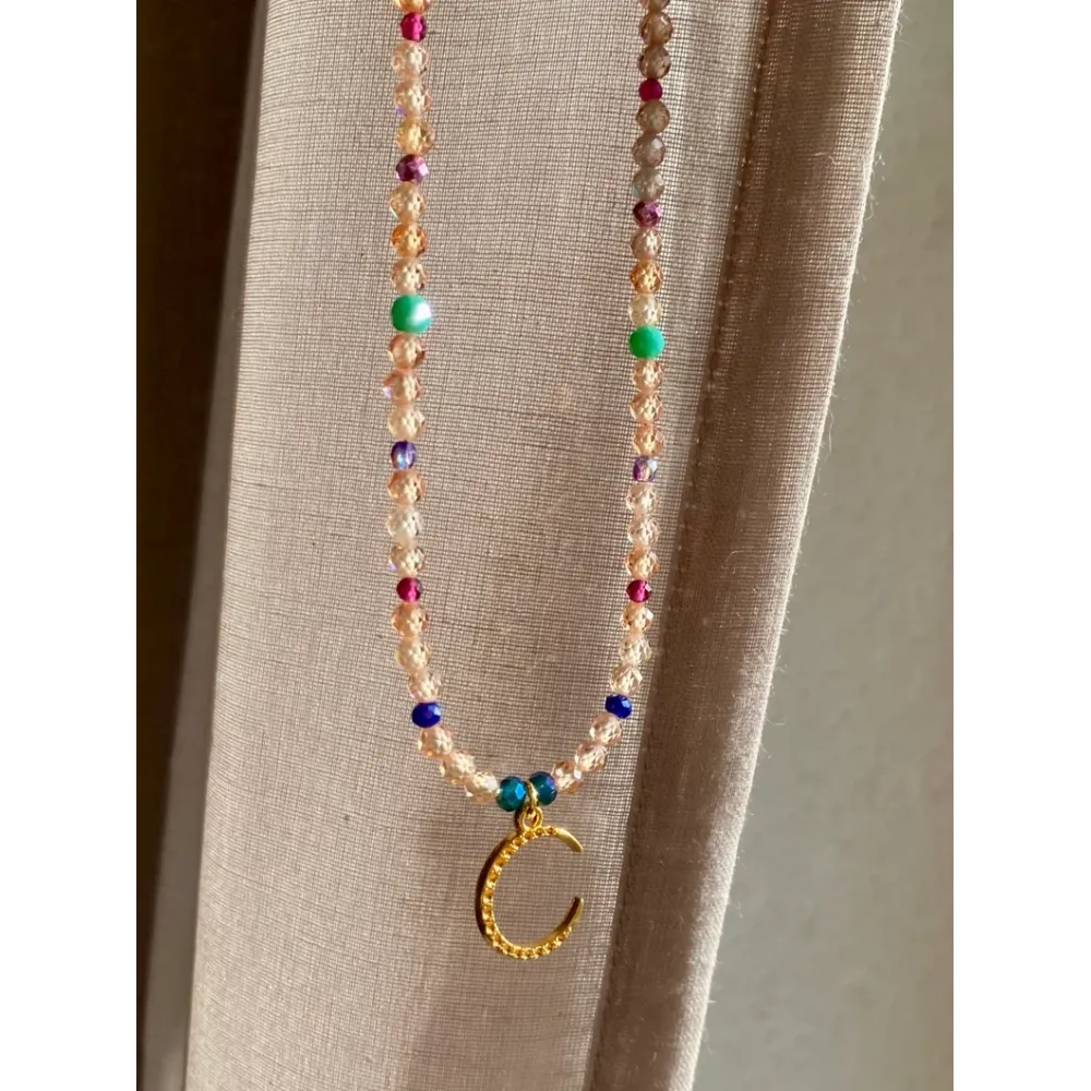 Halskette mit Zirkonia Perlen und Mond Anhänger